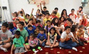 Having fun in the company of a Jain monk? Picture from Children's Day following Know Your Temple session in the Main Temple